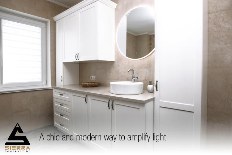 how make a small bathroom look bigger by lighting